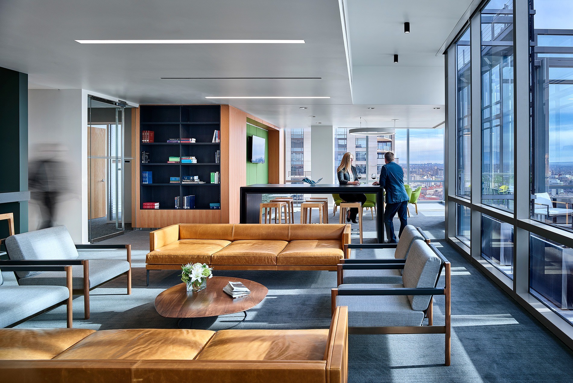 Modern law firm office lounge with city views